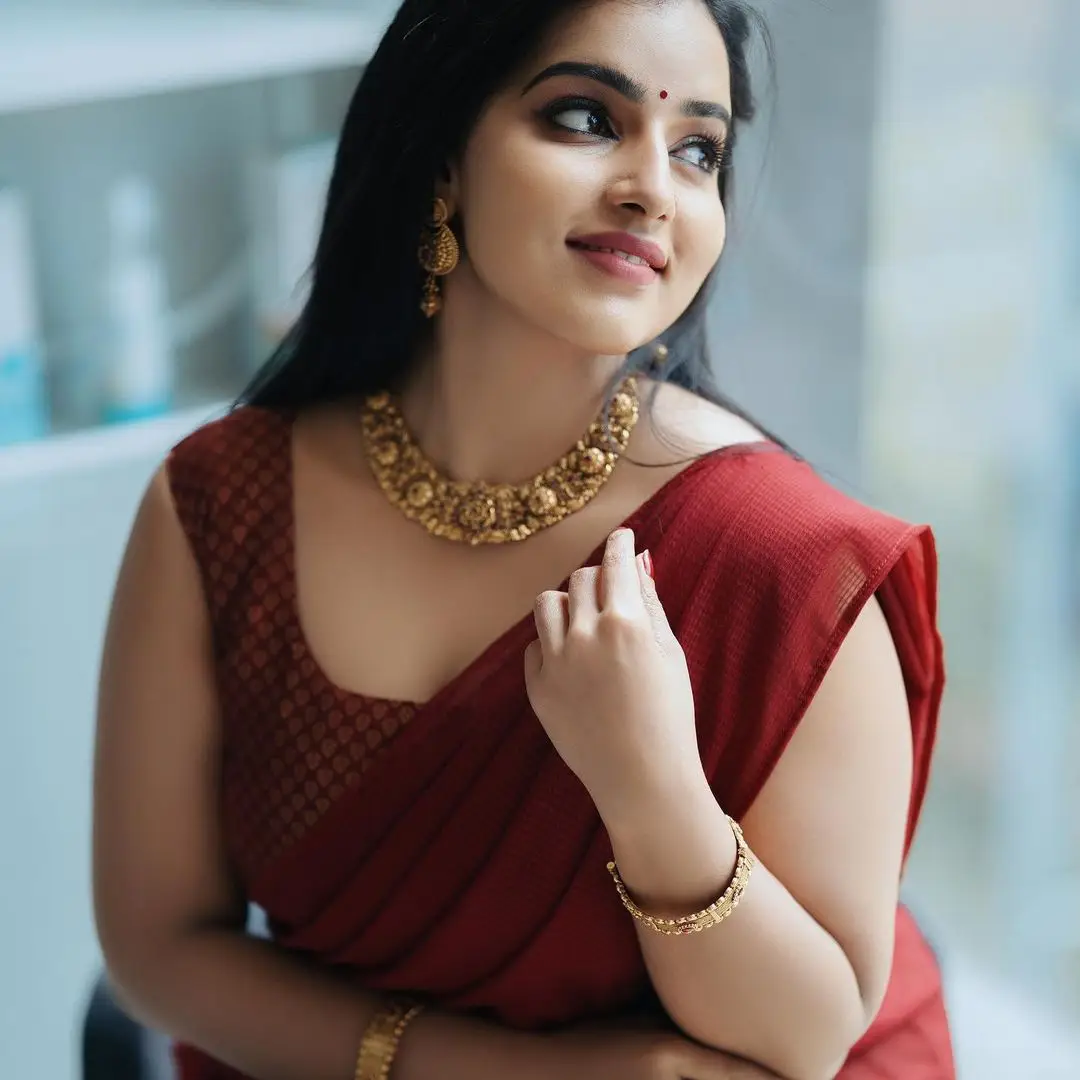 Malavika Menon In South Indian Traditional Red Half Saree Voni Blouse